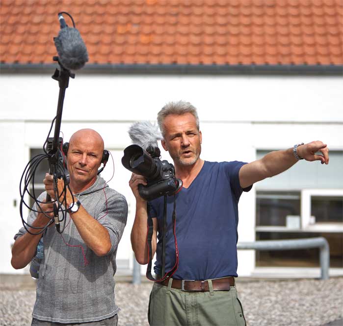 Fotograf optager film Filmhold optager video